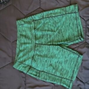 Green biking shorts